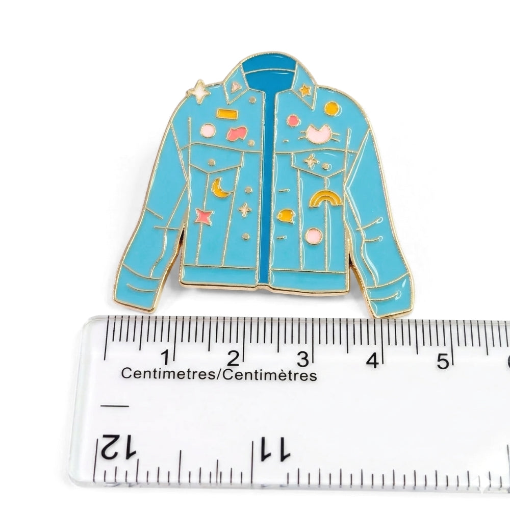 Retro Denim Jacket with Flair | Collectible Pin