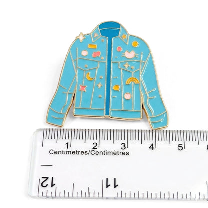 Retro Denim Jacket with Flair | Collectible Pin